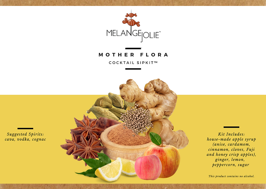 Mélange Jolie Mother Flora Cocktail SipKit™ with ingredients and glass, showcasing aromatic spices and dehydrated fruits.